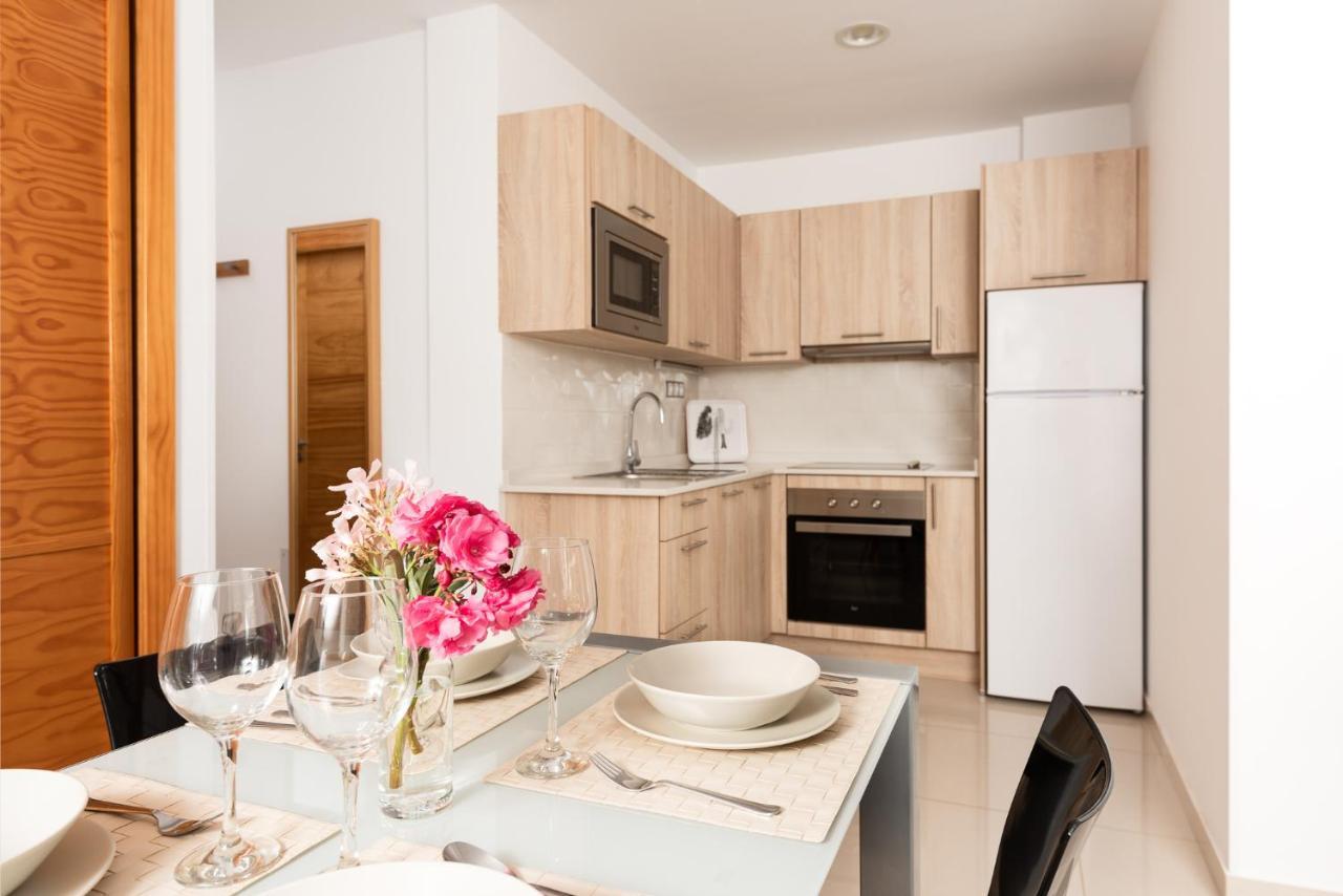 Apartamentos Las Palmeras ปวยร์โต เด มอแกน ภายนอก รูปภาพ