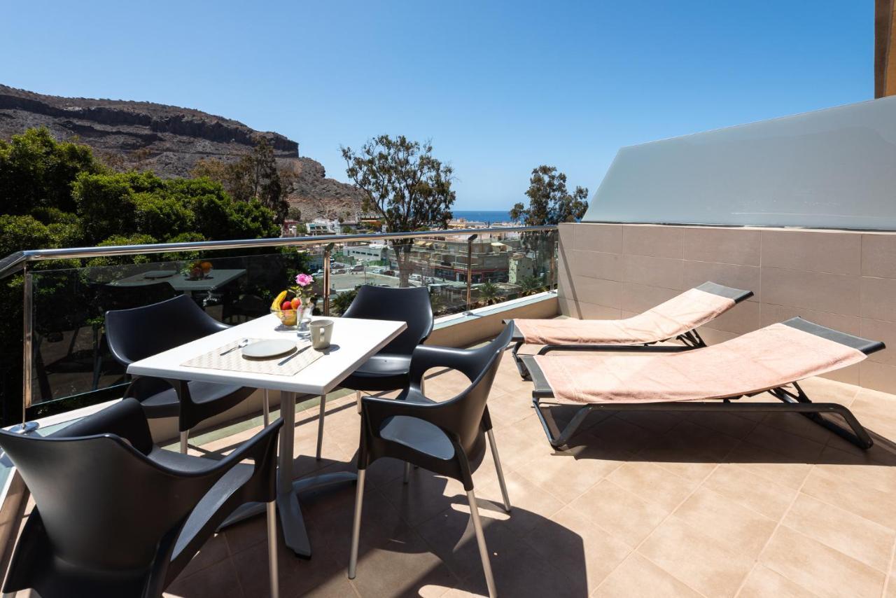 Apartamentos Las Palmeras ปวยร์โต เด มอแกน ภายนอก รูปภาพ