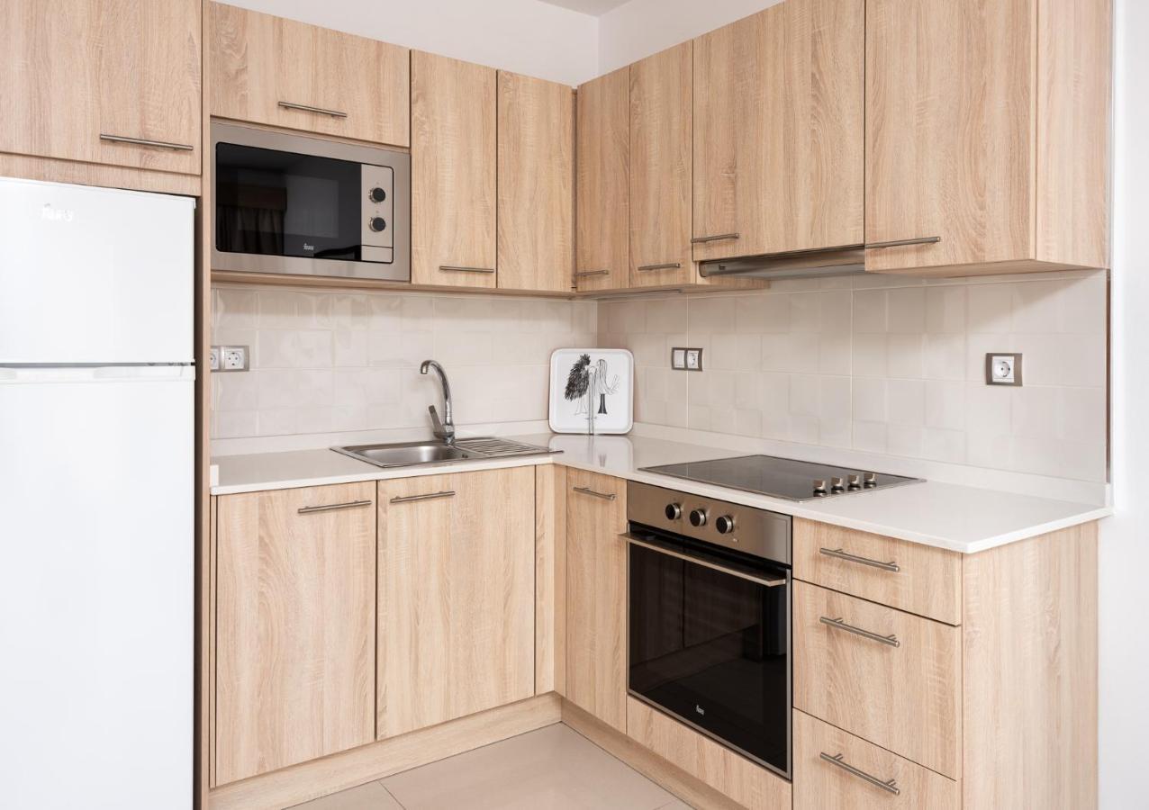 Apartamentos Las Palmeras ปวยร์โต เด มอแกน ภายนอก รูปภาพ