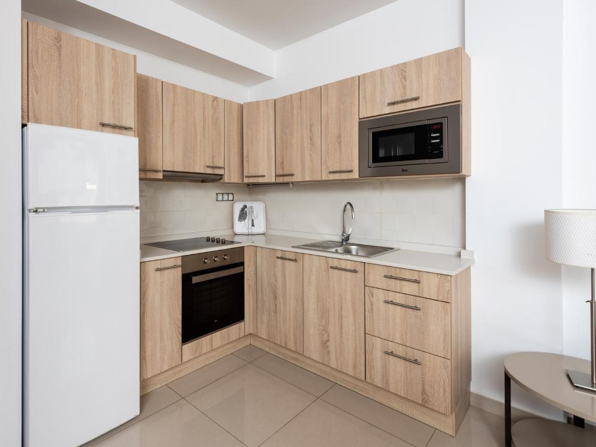 Apartamentos Las Palmeras ปวยร์โต เด มอแกน ภายนอก รูปภาพ